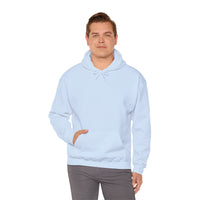 Person wearing a Heavy Blend Hoodie Gildan 18500 Unisex Jersey blank front. Made from 50% Cotton 50% Polyester in Light Blue. Pouch pocket and the tear-away label make for a highly comfortable, scratch-free wearing.