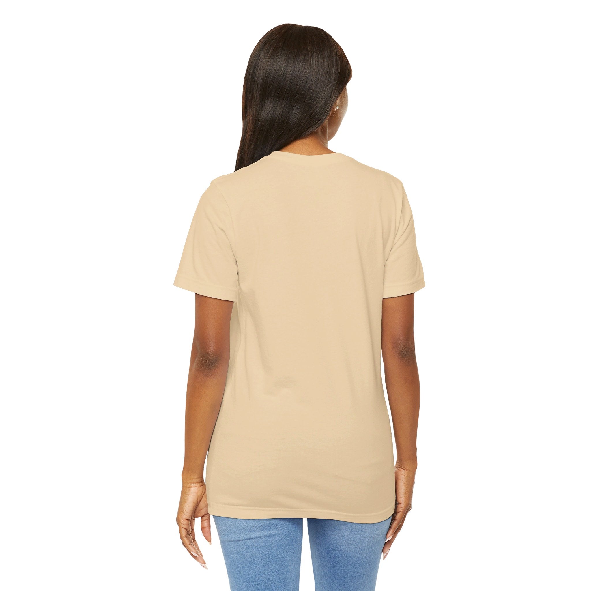 Person wearing Bella+Canvas 3001 Unisex Jersey Short Sleeve Tee with no design on the back. Made from lightweight 100% Airlume combed and ring-spun cotton in Soft cream color, ideal for active and leisure wear.