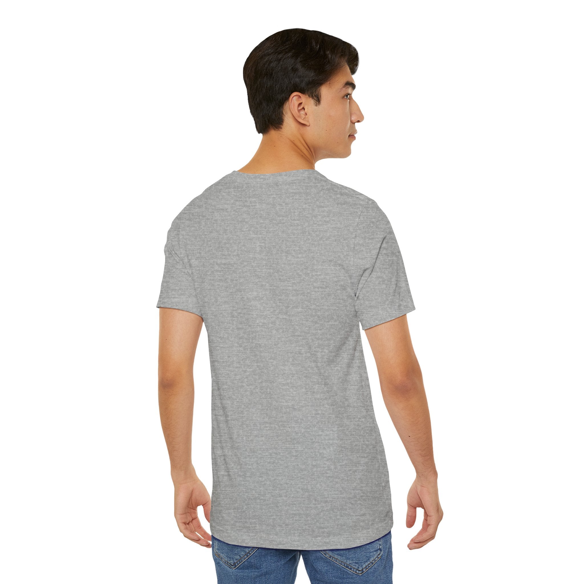 Person wearing a T-Shirt Bella+Canvas 3001 Unisex Jersey Short Sleeve Tee with no design on the back. Made from lightweight 100% Airlume combed and ring-spun cotton in Heather Grey, ideal for active and leisure wear.