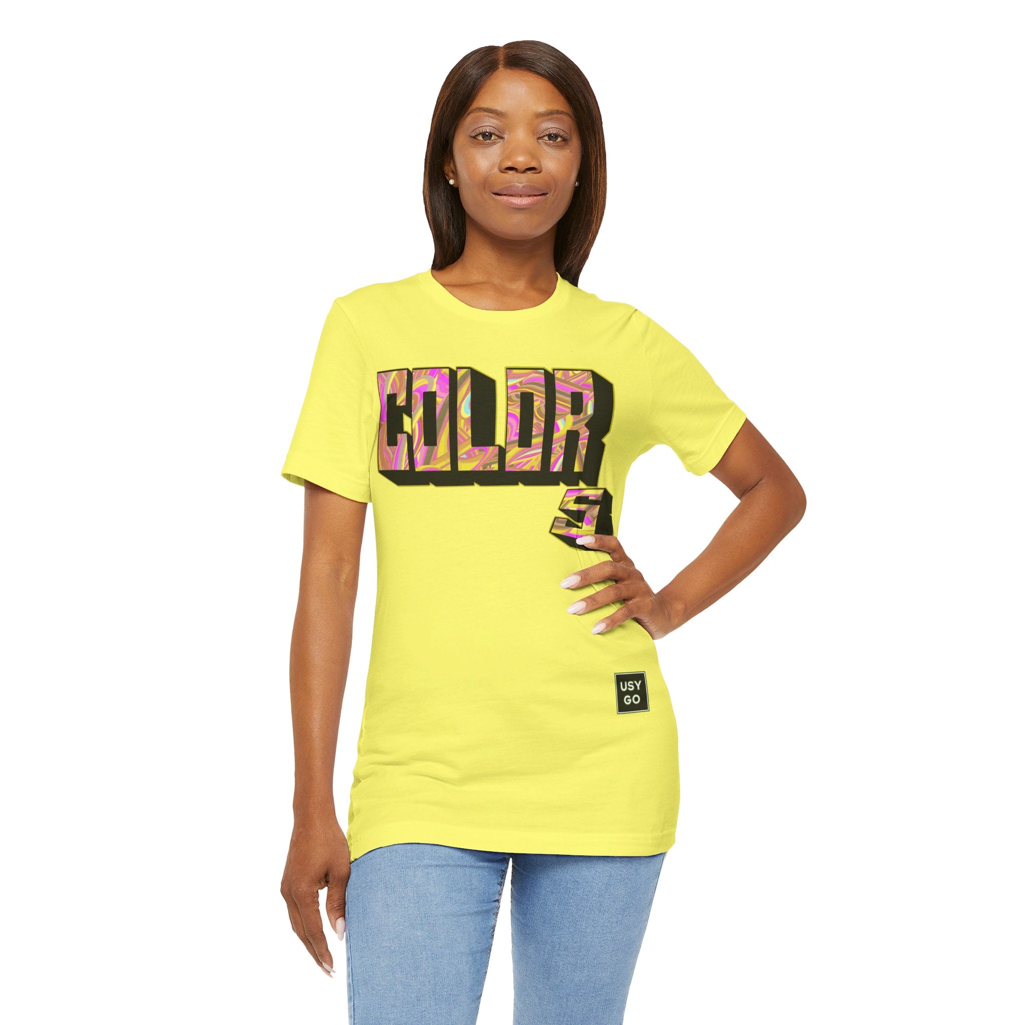 Person wearing Bella+Canvas 3001 Unisex Jersey Short Sleeve Tee with Graffiti Style Colors design by @johnnygraff31 on the front. Made from lightweight 100% Airlume combed and ring-spun cotton in Yellow, ideal for active and leisure wear