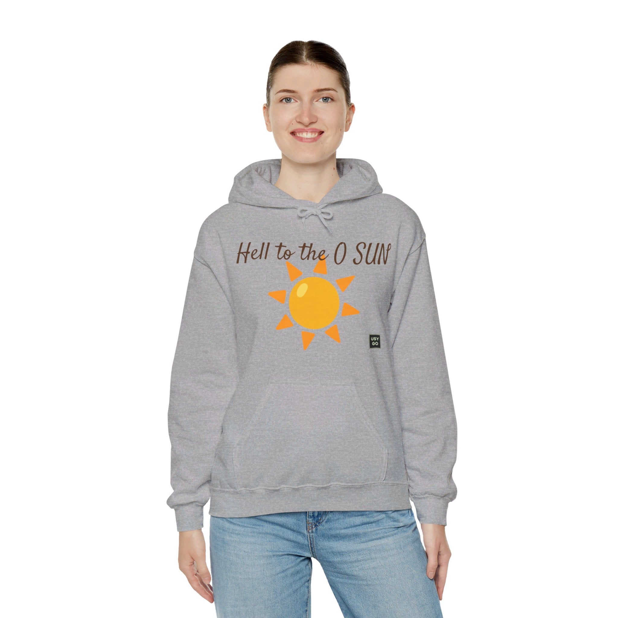 Person wearing a Heavy Blend Hoodie Gildan 18500 Unisex Jersey with Heel to the O SUN design printed on the front. Made from 50% Cotton 50% Polyester in Sport Grey. Pouch pocket and the tear-away label make for a highly comfortable