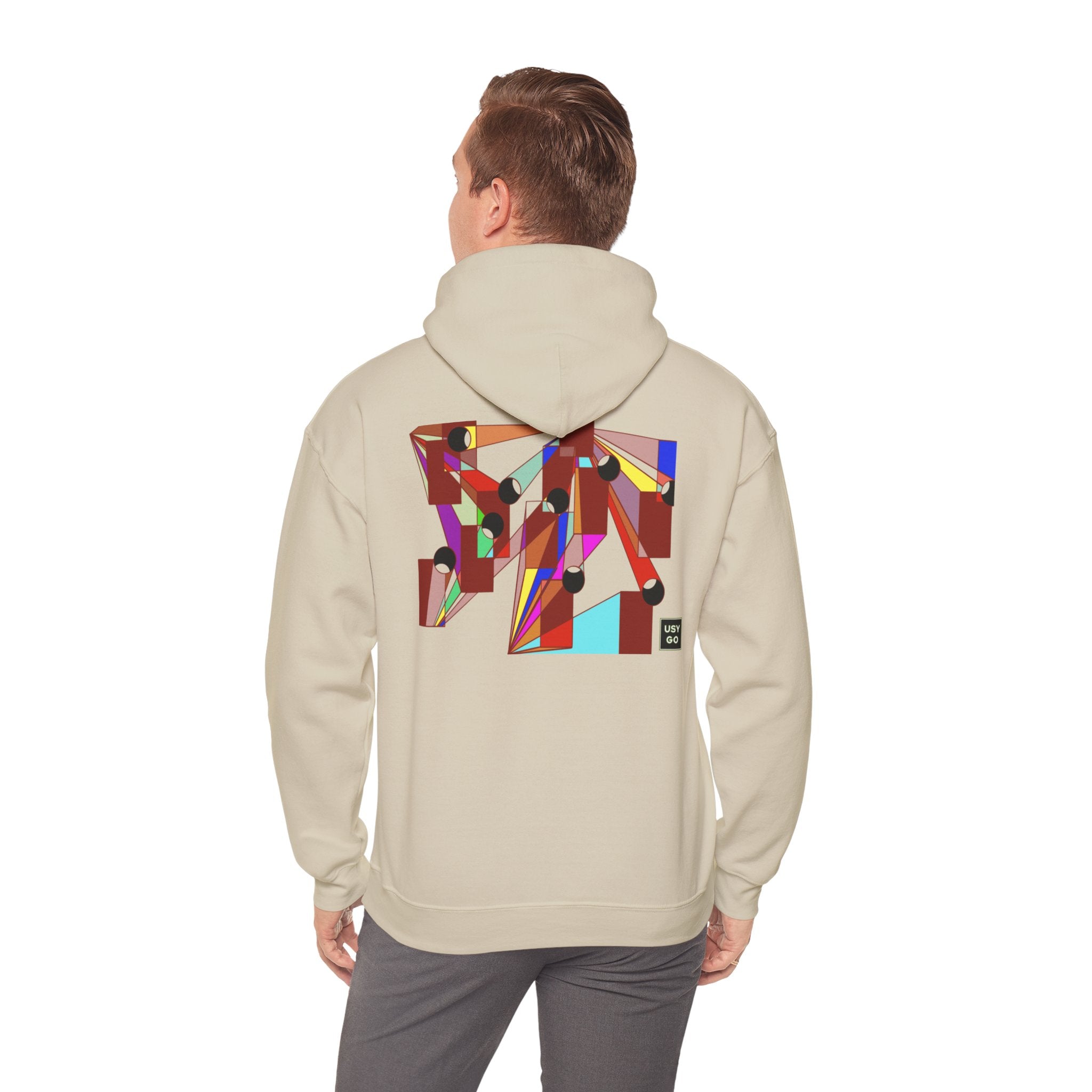 Person wearing a Heavy Blend Hoodie Gildan 18500 Unisex Jersey with DISCO design by @johnnygraff31 printed on the back. Made from 50% Cotton 50% Polyester in Sand. Pouch pocket and the tear-away label make for a highly comfortable, scratch-free wearing