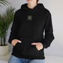 Person wearing a Heavy Blend Hoodie Gildan 18500 Unisex Jersey with USYGO logo on the front. Made from 50% Cotton 50% Polyester in Black. Pouch pocket and the tear-away label make for a highly comfortable, scratch-free wearing.