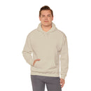 Person wearing a Heavy Blend Hoodie Gildan 18500 Unisex Jersey blank front. Made from 50% Cotton 50% Polyester in Sand. Pouch pocket and the tear-away label make for a highly comfortable, scratch-free wearing.