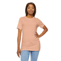 Person wearing a T-Shirt Bella+Canvas 3001 Unisex Jersey Short Sleeve Tee with no design on the front. Made from lightweight 100% Airlume combed and ring-spun cotton in Heather Peach, ideal for active and leisure wear.