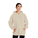 Person wearing a Heavy Blend Hoodie Gildan 18500 Unisex Jersey blank front. Made from 50% Cotton 50% Polyester in Sand. Pouch pocket and the tear-away label make for a highly comfortable, scratch-free wearing.