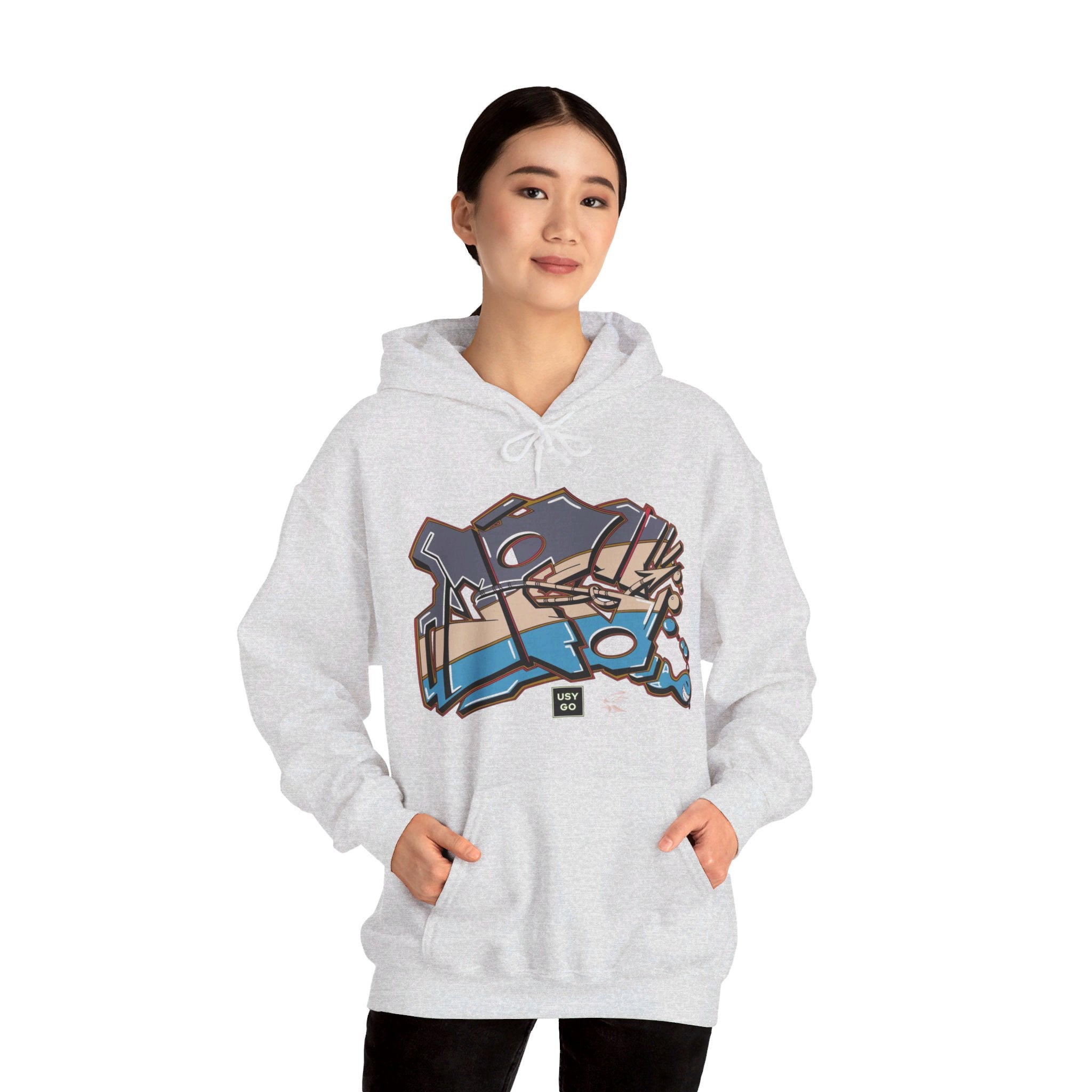 Person wearing a Heavy Blend Hoodie Gildan 18500 Unisex Jersey with JG Fish design by @johnnygraff31 printed on the front. Made from 50% Cotton 50% Polyester in Ash. Pouch pocket and the tear-away label make for a highly comfortable