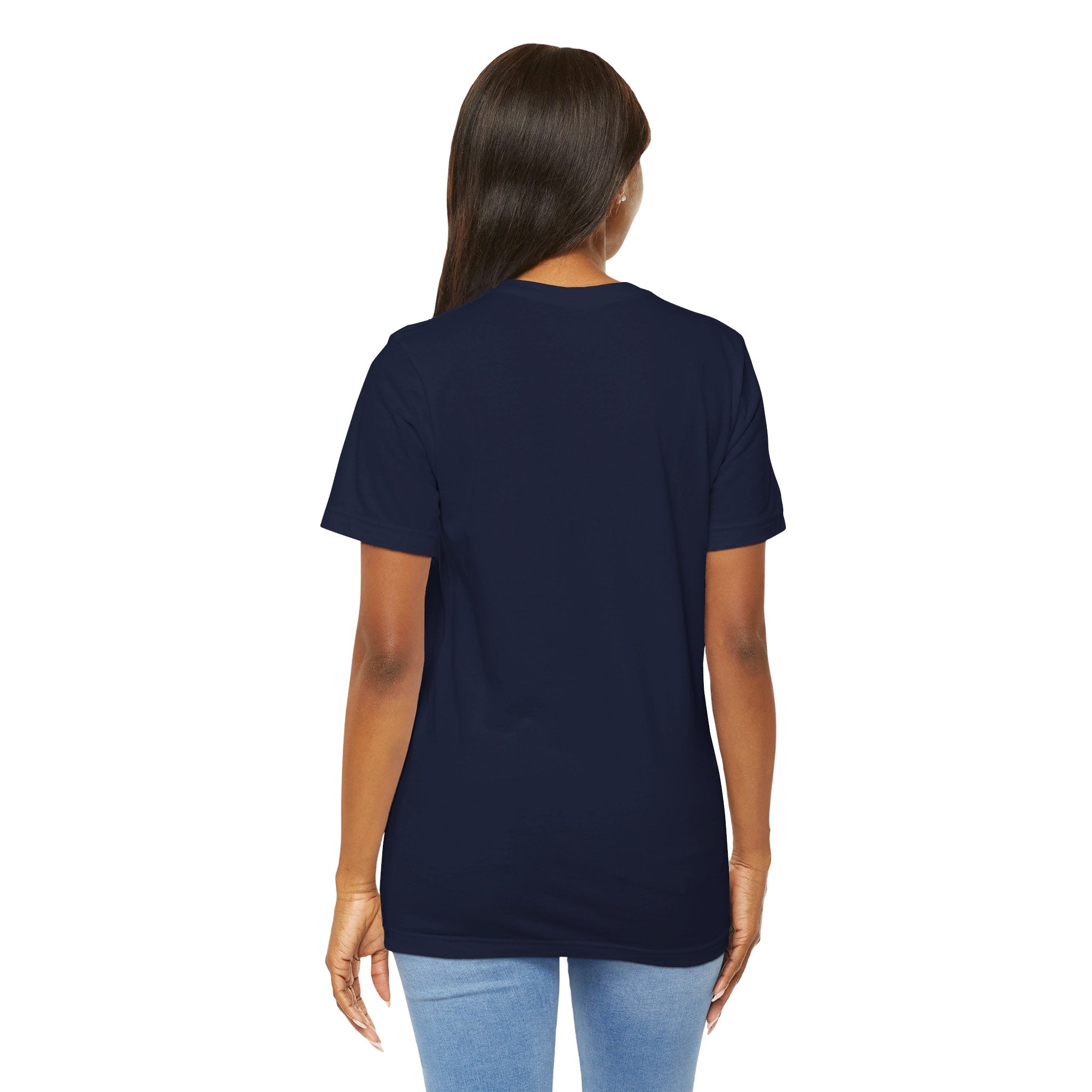 Person wearing Bella+Canvas 3001 Unisex Jersey Short Sleeve Tee with no design on the back. Made from lightweight 100% Airlume combed and ring-spun cotton in Navy, ideal for active and leisure wear.