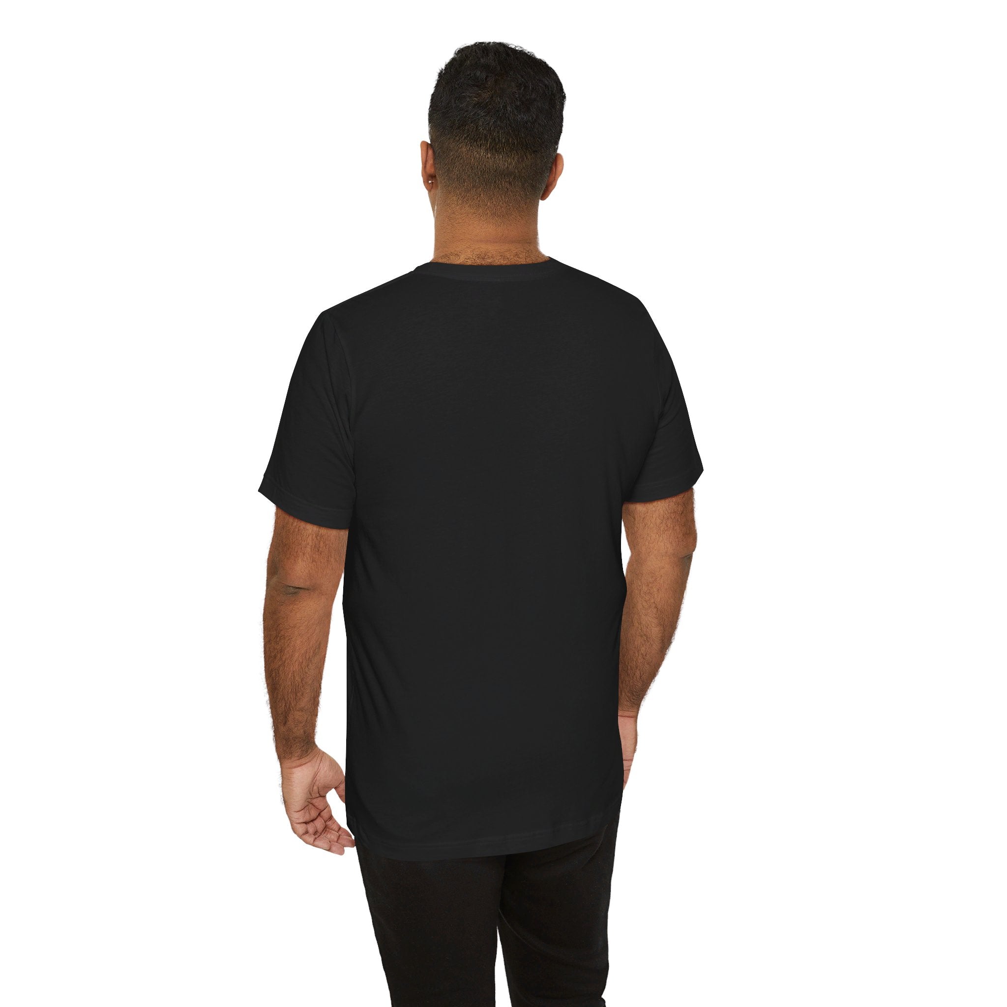 Person wearing Bella+Canvas 3001 Unisex Jersey Short Sleeve Tee with no design on the back. Made from lightweight 100% Airlume combed and ring-spun cotton in Black, ideal for active and leisure wear.