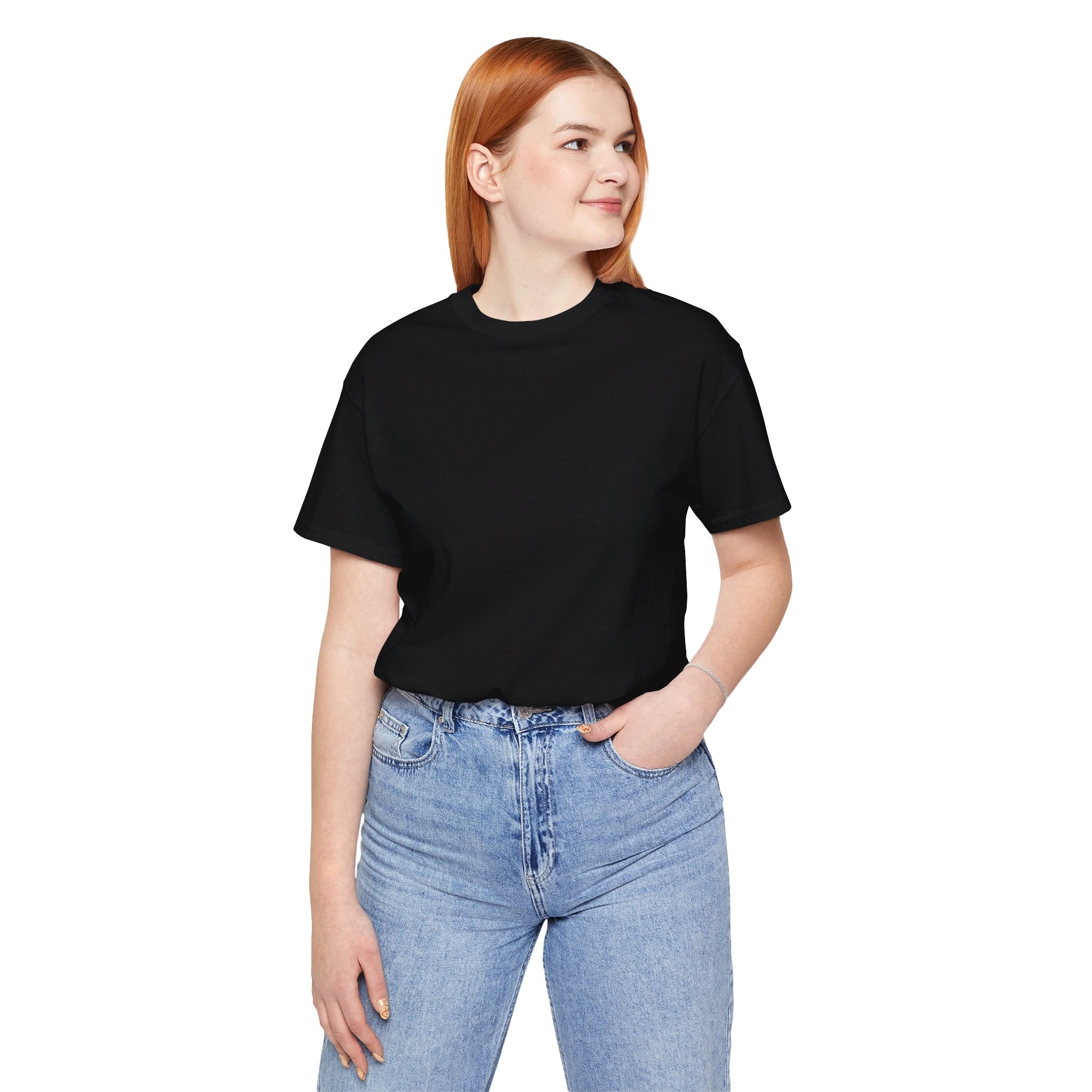 Person wearing a T-Shirt Bella+Canvas 3001 Unisex Jersey Short Sleeve Tee with no design in the front. Made from lightweight 100% Airlume combed and ring-spun cotton in Black, ideal for active and leisure wear.