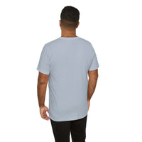 Person wearing Bella+Canvas 3001 Unisex Jersey Short Sleeve Tee with no design on the back. Made from lightweight 100% Airlume combed and ring-spun cotton in Light Blue, ideal for active and leisure wear.