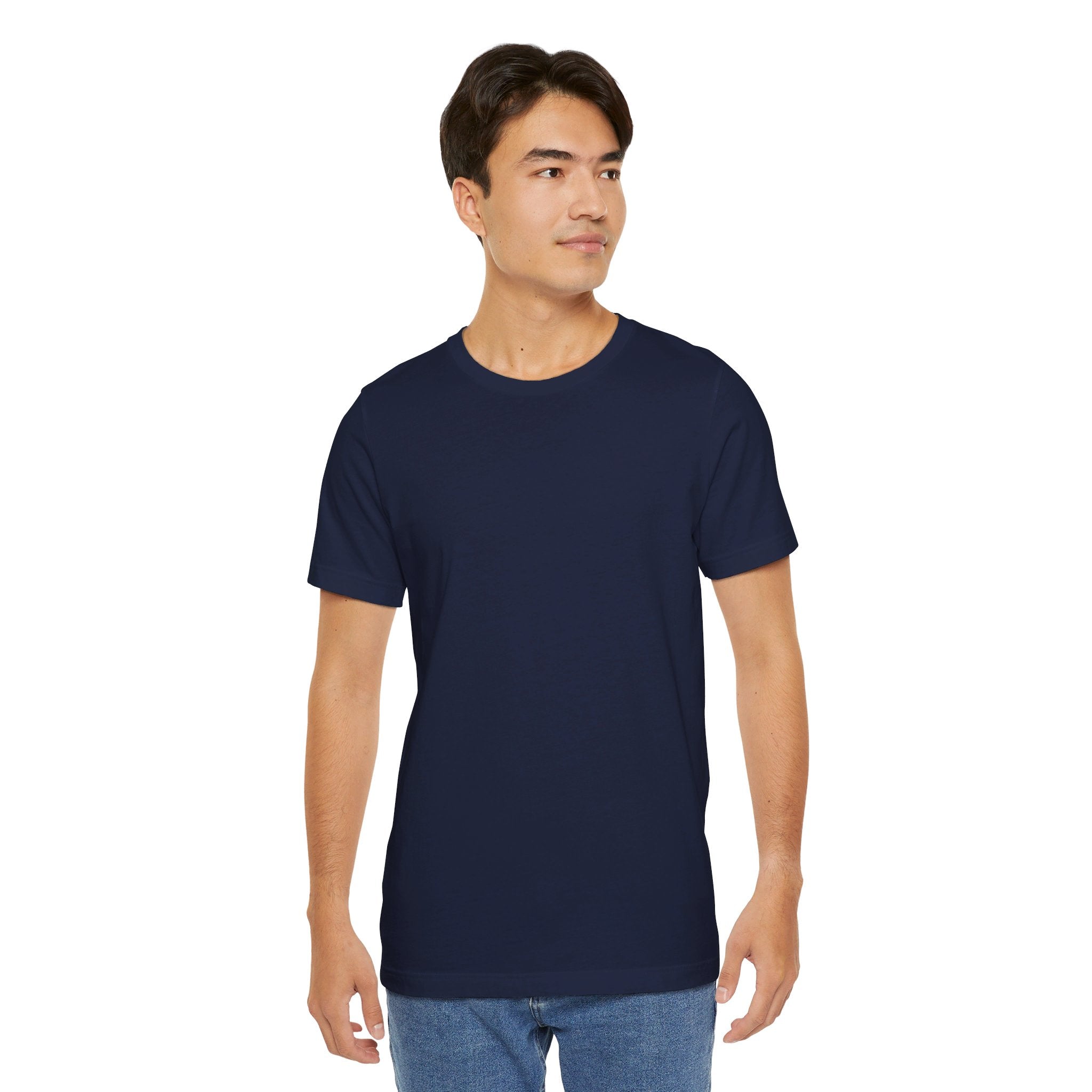 Person wearing Bella+Canvas 3001 Unisex Jersey Short Sleeve Tee with no design on the front. Made from lightweight 100% Airlume combed and ring-spun cotton Navy, ideal for active and leisure wear.