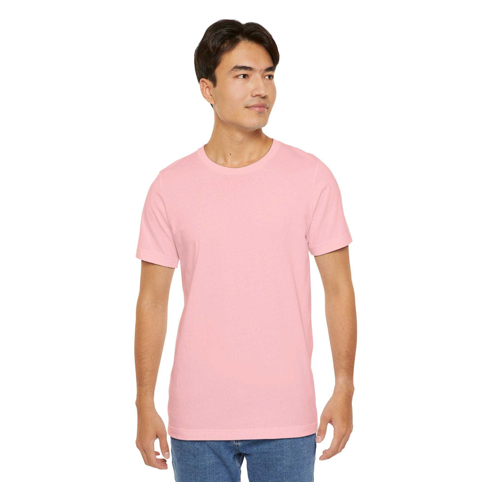 Person wearing a T-Shirt Bella+Canvas 3001 Unisex Jersey Short Sleeve Tee withno designe on the front. Made from lightweight 100% Airlume combed and ring-spun cotton in Pink, ideal for active and leisure wear.